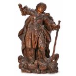 Hl. Michael, Früh-Barock, wohl um 1700.Weichholz geschnitzt, dkl. lasiert. Standfigur in bewegter