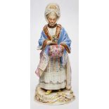 Dame mit Muff, Meissen um 1890.Entw.: M.V. Acier. Standfigur in Spitzen-be- setztem Kleid u.