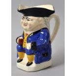 Kleiner Figurenkrug/ Toby jug, England, 19./ 20. Jh.Steingut, polychrom bemalt. Figur sitzender Herr