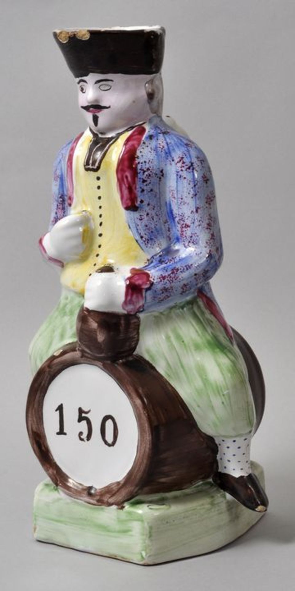Figurenkrug/ Toby jug, wohl England, 19. Jh.Keramik, polychrome Bemalung. Gestalt eines Mannes mit