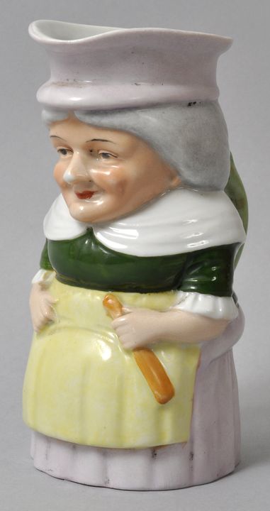 Kleiner Figurenkrug/ Toby jug, Sitzendorf/ Thüringen, E. 19./ Anf. 20. Jh.Porzellan, polychrom