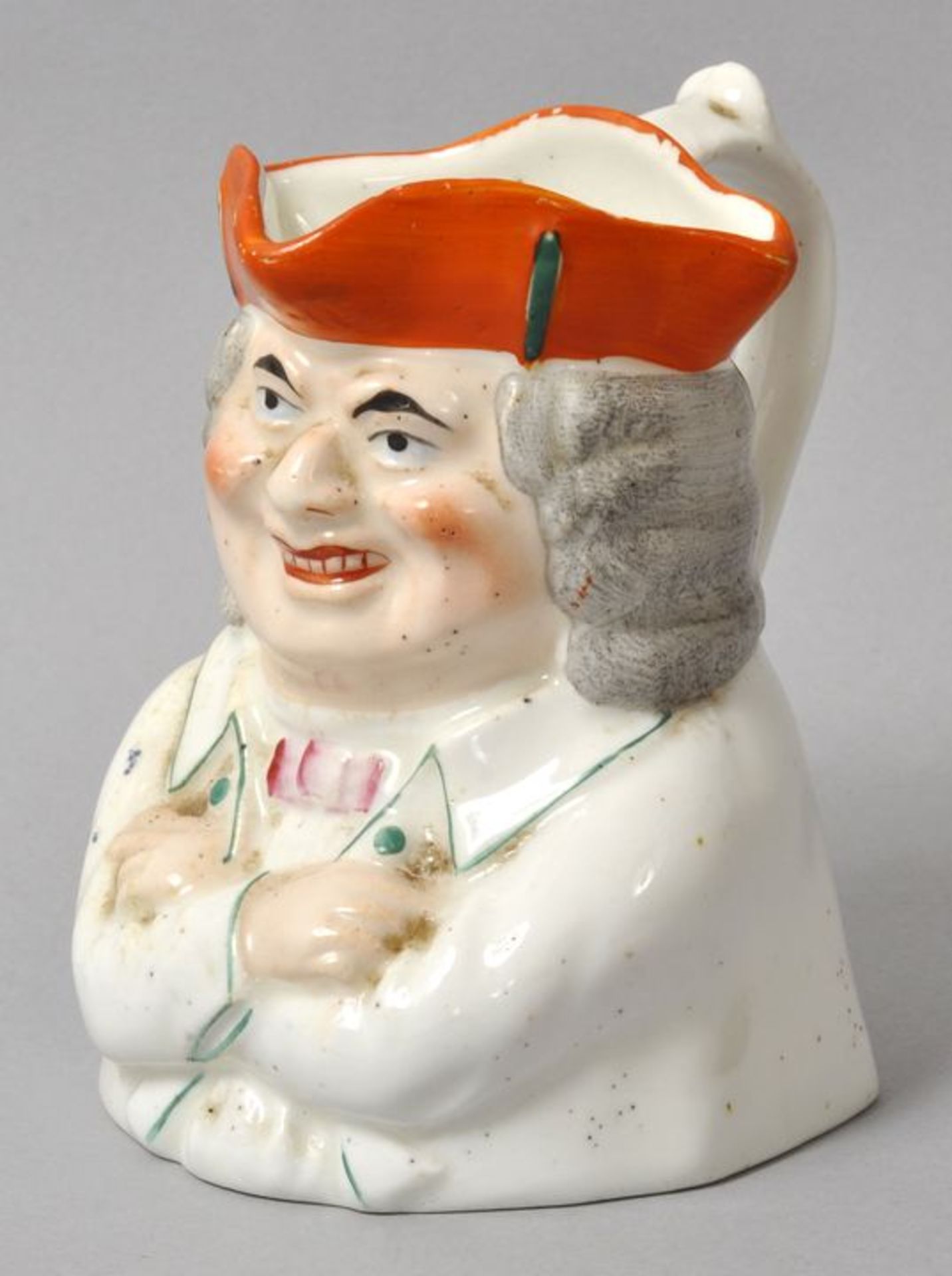 Kleiner Figurenkrug/ character jug, England (?), 19. Jh.Porzellan, polychrom bemalt, Halbfigur eines