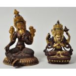 Zwei Figuren: Lakshmi und Bodhisattva, Tibet/ Nepal, 20. Jh.Bronze, patiniert, partiell vergoldet,