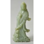 Guanyin, China, 19./ 20. Jh.Hellgrüne Jade. Elegant geschwungene Figur auf Lotossockel. H. 25 cm