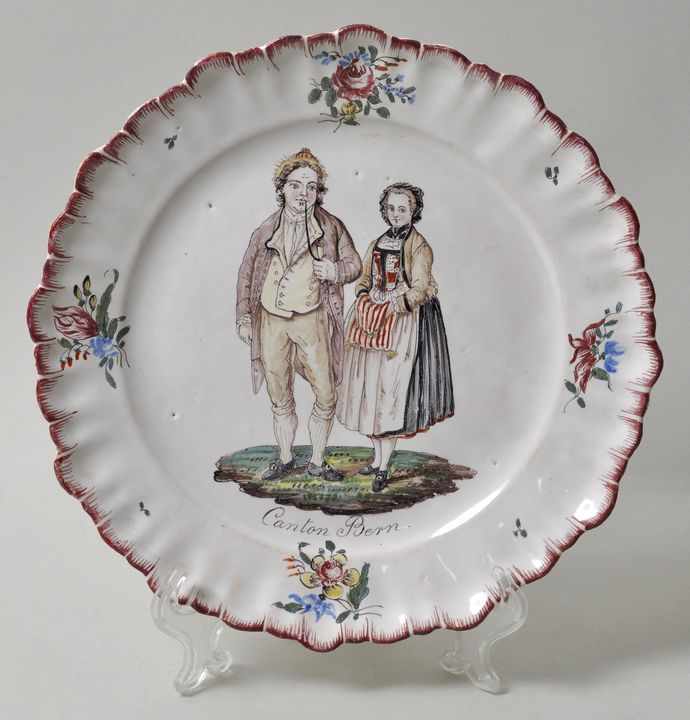 Teller mit Berner Trachtenpaar, Zürich, 2. H. 18. Jh.Fayence, in polychromen Muffelfarben auf weißer