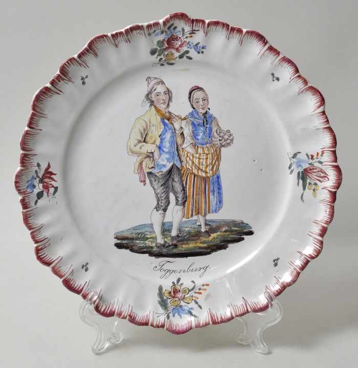 Teller mit Toggenburger Trachtenpaar, Zürich, 2. H. 18. Jh.Fayence, in polychromen Muffelfarben