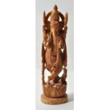 Indien. Ganesha.Sandelholz, geschnitzt. Aufwenig gearbeitete Figur der hinduistischen Gottheit