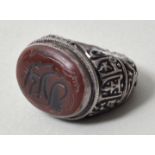 Amulett-Ring/ Shia Ring, arabischer Kulturraum, wohl 19. Jh.Silber, massive Schiene in Treibarbeit