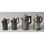 Vier Mokka-bzw. Kaffeekannen, 19. Jh.Zinn. Drei Stück datiert "1838", "1851" bzw. "1875". Griffe