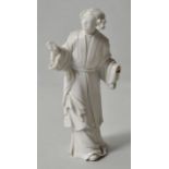 Porzellanfigur Junge Frau im Kimono, China, 20. Jh.Blanc de Chine. Bestoßen. H. 13,5 cm- - -25.