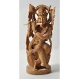 Indien. Krishna.Sandelholz, geschnitzt. Aufwenig gearbeitete Figur der hinduistischen Gottheit