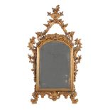 A Continental carved giltwood wall mirror, late 18th/early 19th century