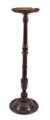 A Continental turned and stained walnut candle stand or torchère, 18th century