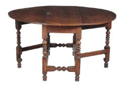 A mahogany gateleg table in 17th century style