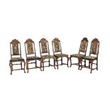 A set of six carved beech wood and upholstered dining chairs, early 18th century