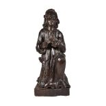 A Continental carved and stained wood figure of a kneeling penitent, 18th century