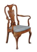 A George II walnut and upholstered arm chair, mid 18th century