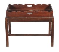 A George II mahogany tray on later stand, mid 18th century