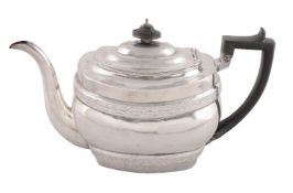 A George III silver oblong baluster tea pot by Solomon Hougham, London 1804