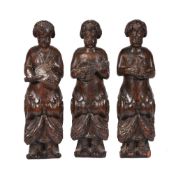 Three northern European carved term figures of musicians, late 17th century