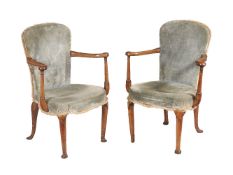 A pair of George I walnut and upholstered armchairs, early 18th century