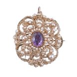 ϒ An early Victorian amethyst and seed pearl brooch/pendant