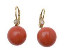 ϒ A pair of coral and diamond earrings