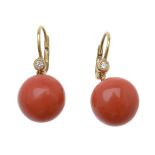 ϒ A pair of coral and diamond earrings