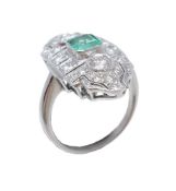 An emerald and diamond ring