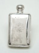 A late Victorian silver rounded rectangular spirit flask by Alexander Clark