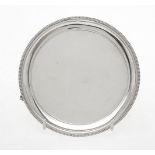 A silver circular waiter by R. Hodd & Son