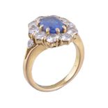 A sapphire and diamond cluster ring