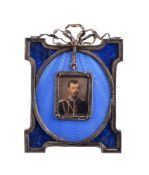 A Continental silver coloured, enamel and lapis lazuli set miniature frame