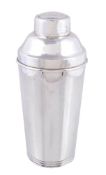 An American silver coloured cocktail shaker by S. Kirk & Son