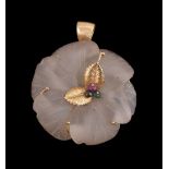 A rock crystal and gem set flower head pendant