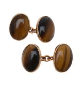 A pair of tiger's eye cufflinks