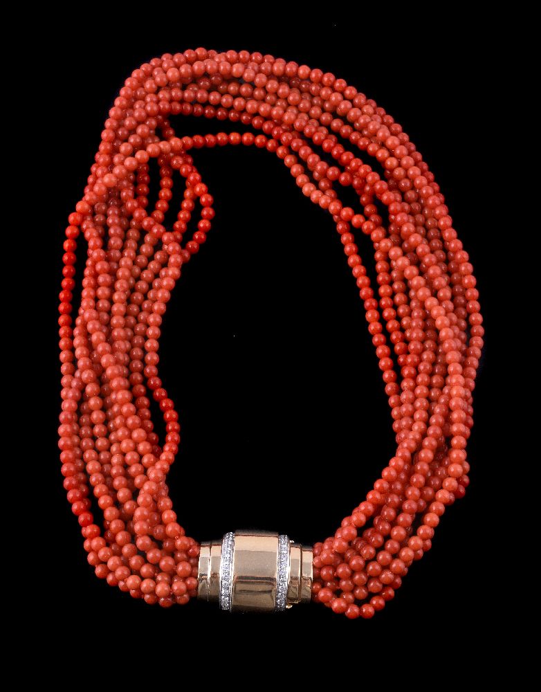 ϒ A multi strand coral bead necklace