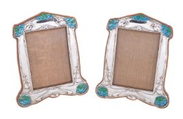 A matched pair of Art Nouveau silver photograph frames
