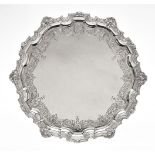 A silver shaped circular salver by Mappin and Webb