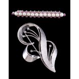 A cultured pearl and ruby bar brooch