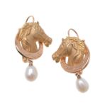 A pair of horse head pendant earrings