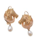 A pair of horse head pendant earrings