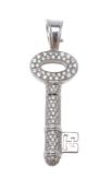 A diamond key pendant by Theo Fennell