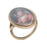 An antique and later miniature panel ring