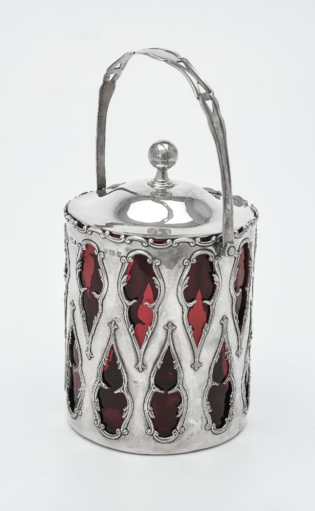 An Edwardian silver cylindrical biscuit barrel by Henry Williamson Ltd