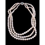 A three row cultured pearl necklace