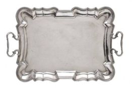 An Italian silver coloured shaped rectangular tray