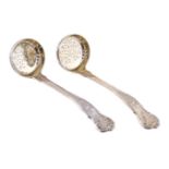 A pair of Victorian silver gilt Bright Vine pattern sugar sifting spoons by George Adams