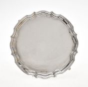 A silver shaped circular salver by A. E. Poston & Co. Ltd