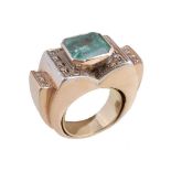 A emerald and diamond dress ring